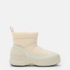 MEZZALUNA PUFFY CREAM BOOTS